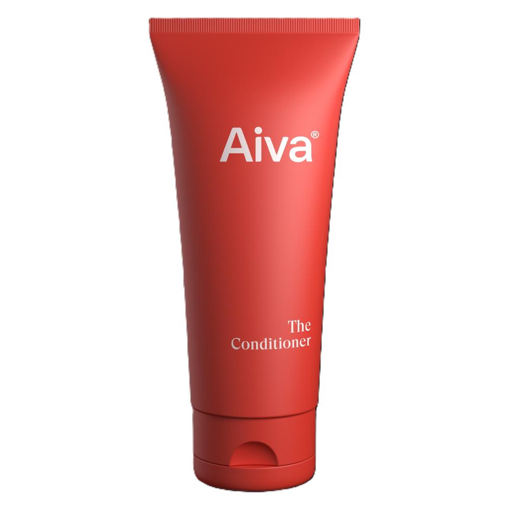 AIVA The Conditioner; punainen muovituubi läppäkorkilla, seisoo pystyssä; pakkaus on sileä ja sylinterinmuotoinen; luettavassa etikettitekstissä lukee ”AIVA The Conditioner Nourishing Care Formula”; tuote kuvattu valkoista taustaa vasten, ei ihmisiä, käsiä tai rekvisiittaa näkyvissä.