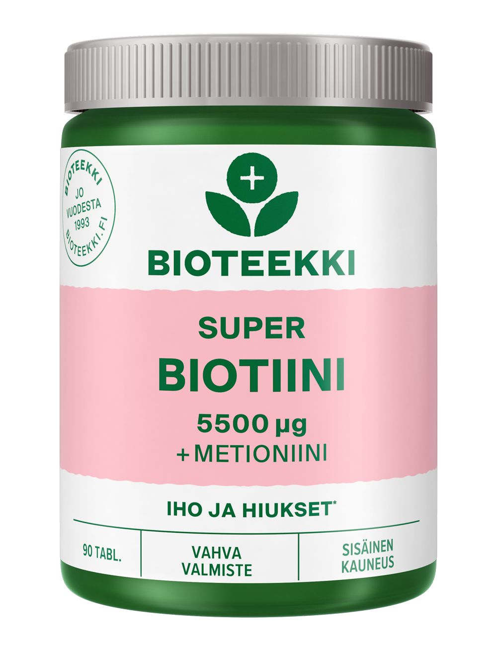 Bioteekki Super Biotiini 5500 mikrog -muovipurkki; vihreä ja pinkki väritys; mattapintainen, sylinterimäinen purkki valkoisella kierrekorkilla; etiketissä lihavoidulla tekstausvapaalla kirjasimella valkoista ja vihreää tekstiä pinkkiä ja vihreää pohjaa vasten, teksti "BIOTEEKKI SUPER BIOTIINI 5500 μg + METIONIINI"; sisällöksi ilmoitettu 90 tablettia iholle ja hiuksille; suomenkielinen etiketti; kuvattu yksiväristä studiotaustaa vasten.