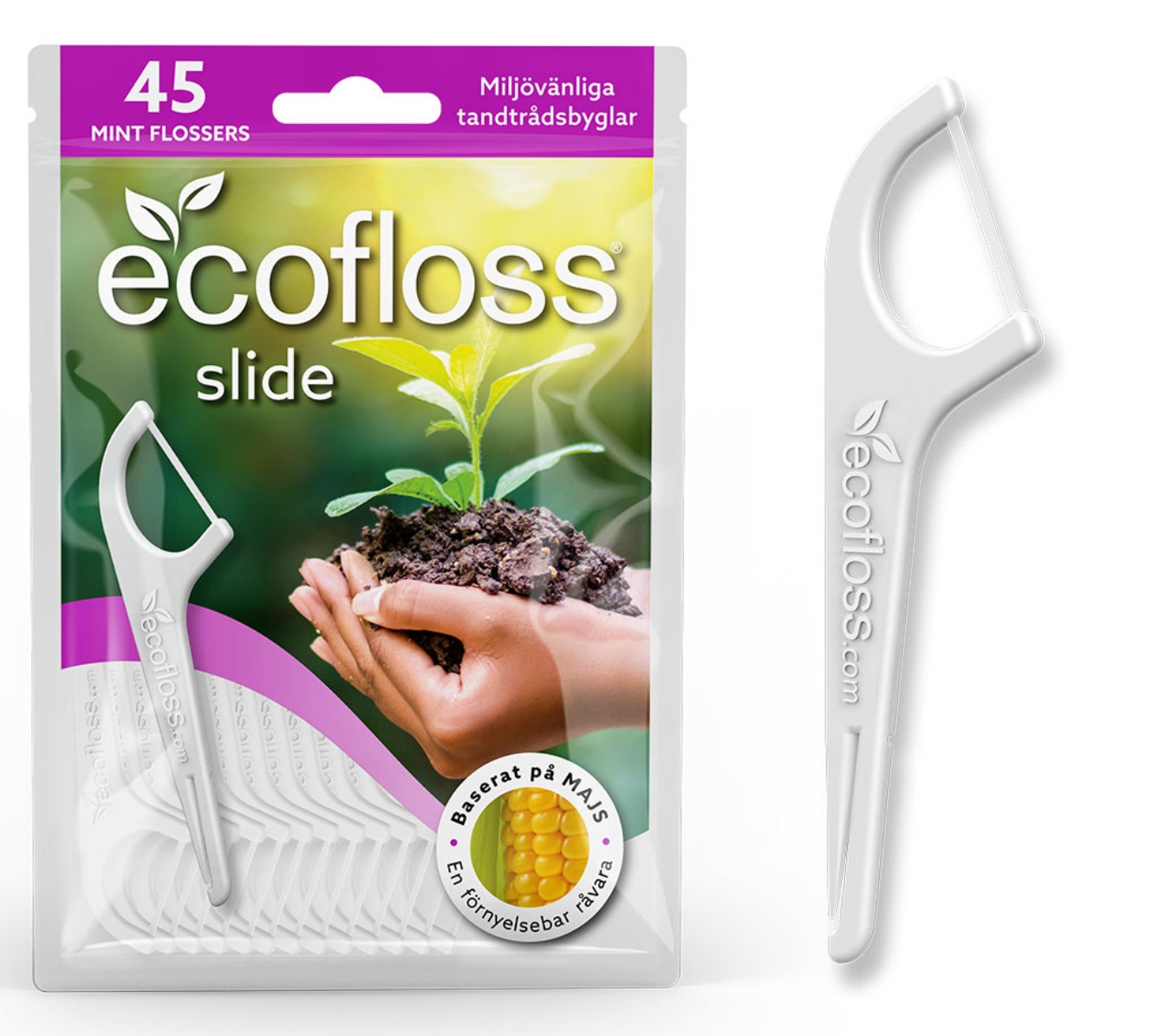 Ecofloss Slide Hammaslankain; pakkaus ecofloss slide -minttuhammaslankaimia, sisältää 45 biohajoavaa hammaslankainta, ympäristöystävällisiä väittämiä, maissikuvake ja kuva käsistä pitelemässä maata ja itävää tainta; yksi hammaslankain on esillä erikseen oikealla; pakkaus on mattapintainen vihreän ja valkoisen väreissä groteskitekstillä; erillinen hammaslankain on valkoinen kaareutuvalla kahvalla; tausta vaalea ja yksivärinen, ei ihmisiä näkyvissä.