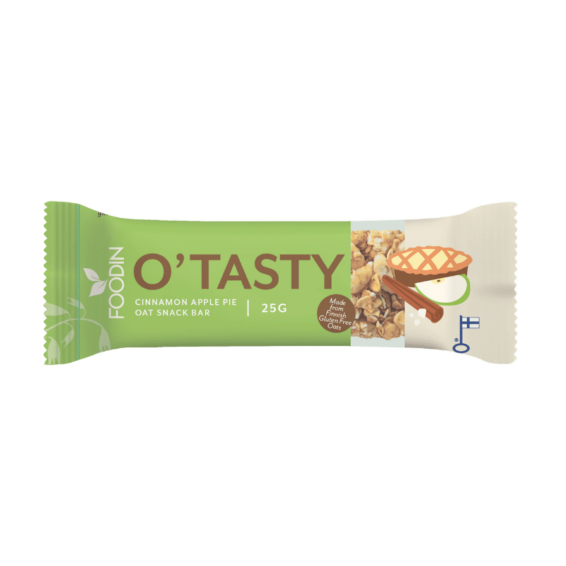 Foodin O'Tasty Oat Bar Cinnamon Apple Pie, 25 g; vihreä-valkoinen taipuisa, kiiltäväpintainen kääre; kannessa litteät kuvitukset omenapiirakkaviipaleesta ja kaurahiutaleista; groteskikirjasin esittää nimen "OTasty" ja tuotetiedot, mukaan lukien "gluteeniton" ja "tehty täysjyväkauroista"; ei ihmisiä tai muita rekvisiittoja näkyvissä, kuvattu vaalealla taustalla tavanomaisessa tuotekuvassa.
