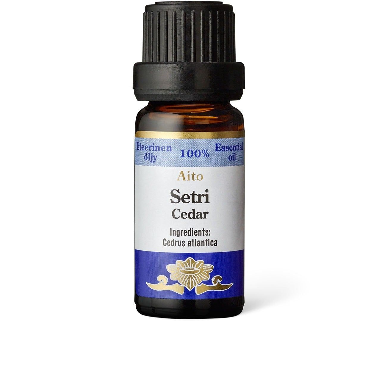 A brown glass bottle labeled Aito Setri Cedar essential oil with a black cap. The bottle is cylindrical with a smooth, glossy surface. The label has blue accents, a floral graphic, and simple sans-serif typography. “Cedrus atlantica” is listed as the ingredient. Product appears against a plain background in a centered product shot.