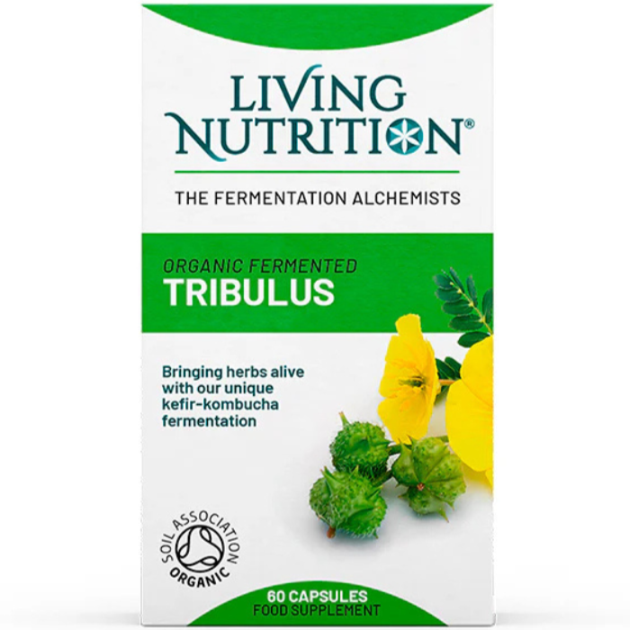A box of Living Nutrition Organic Fermented Tribulus capsules is shown standing upright. The packaging is mostly white with green and yellow accents, printed matte. Illustrations of yellow flowers and green leaves are on the front. The label includes the brand name in bold, sans-serif type, references to kefir-kombucha fermentation, and Soil Association organic certification. There are no people or hands visible; plain background. A box of Living Nutrition Organic Fermented Tribulus capsules, featuring