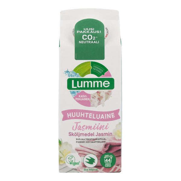 A carton of Lumme brand jasmine fabric softener with green and pink accents, featuring a vegan logo and text highlighting its CO2-neutral, plant-based formula, as well as eco-friendly packaging. The carton has a rectangular shape with a screw cap, matte finish, and clear product labeling in modern sans-serif font. No people or hands are visible; the background is plain white in a studio shot.