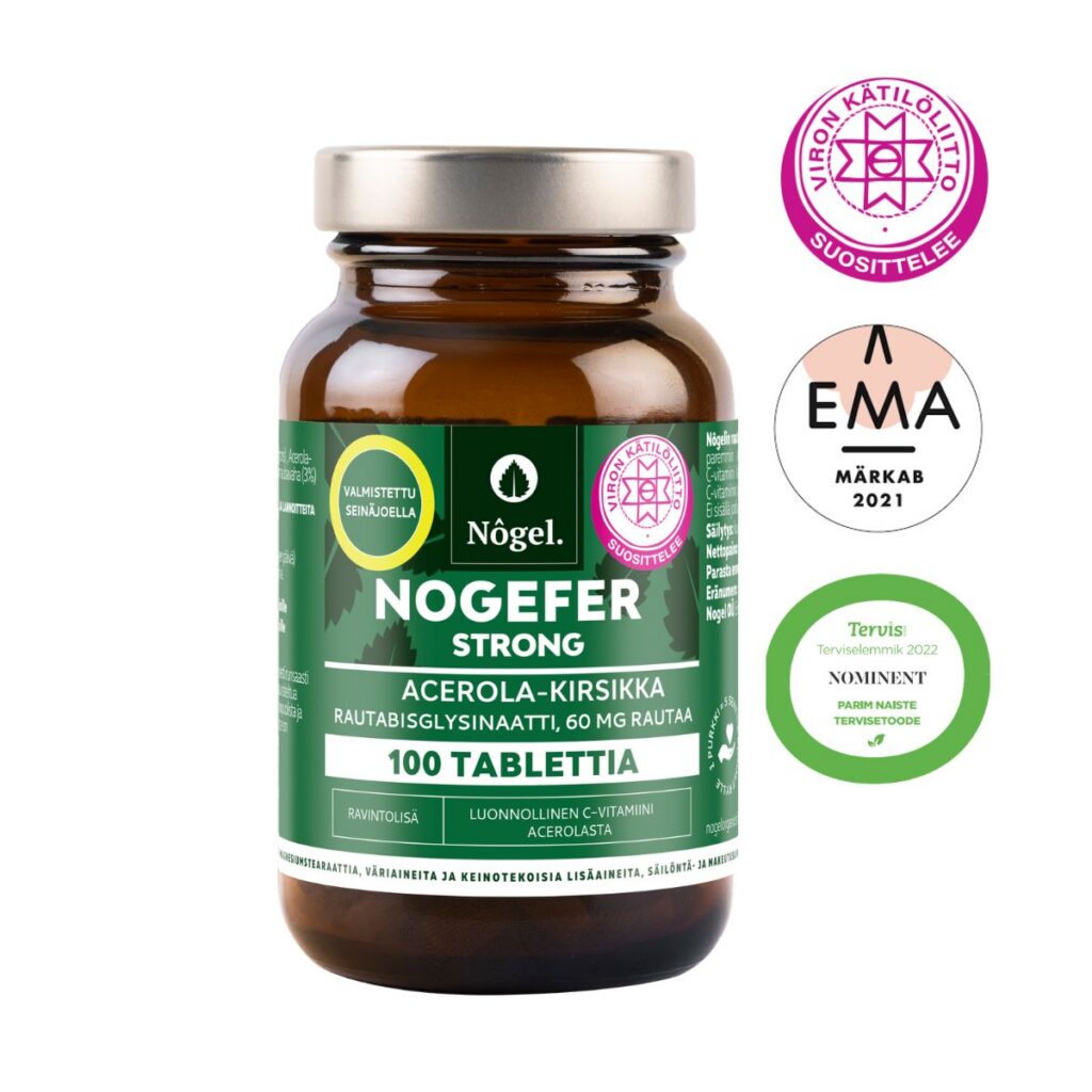 NOGEFER Strong, 100 tablettia asero-kirsikkarautalisää; ruskea lasipullo vihreällä ja valkoisella tekstillä, pinta kiiltävä; etiketissä groteskityyppiä, sertifiointilogoja ja yksityiskohtaista tuotetietoa; pullo pystyssä yksin vaalealla taustalla, ei ihmisiä tai käsiä.