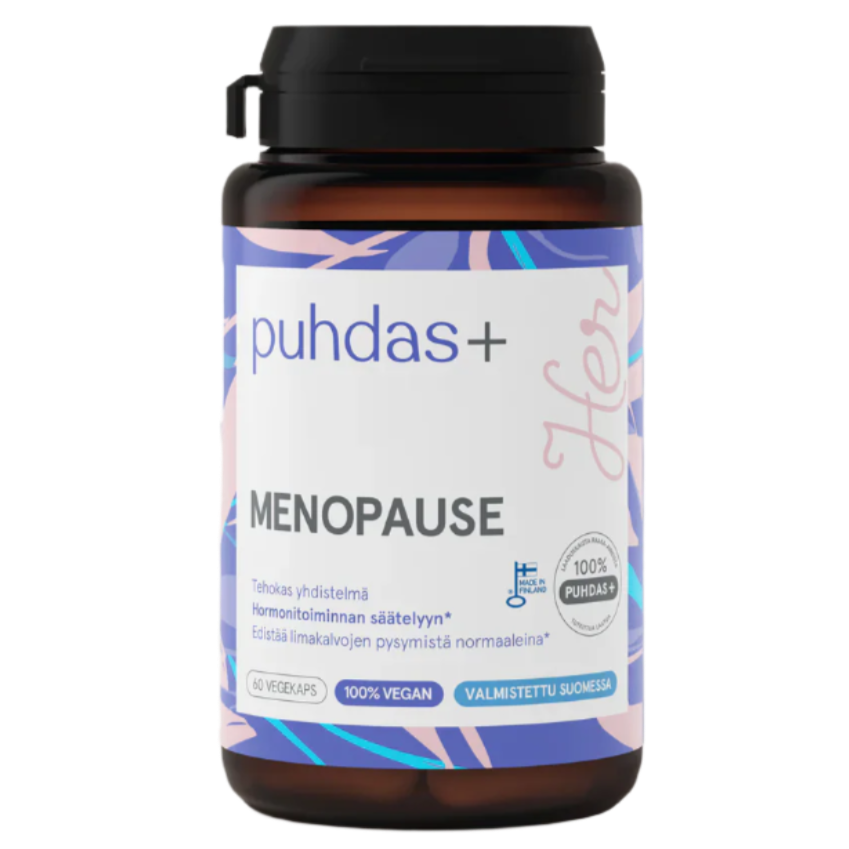 Puhdas+ Menopause; pullo Puhdas+ Menopause -ravintolisää värikkäällä etiketillä, tekstissä merkintä 100 % vegaaninen ja 60 kasviskapselia; tuote suunniteltu tukemaan naisia vaihdevuosien aikana; pullo ruskea mustalla korkilla; lieriömäinen muoviastia mattapinnalla, etiketissä lihavoitua groteskityyppografiaa tuotetiedoille; ei ihmisiä tai käsiä; tasainen tausta pitää huomion tuotteessa, joka on keskitetty studiokuvassa.
