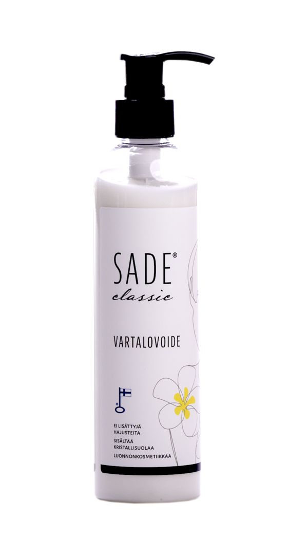A bottle of SADE classic vartalovoide (body lotion) with a black pump dispenser, white matte label, and minimalist line drawing of a flower on the front. The packaging is cylindrical and opaque. Finnish text on the label refers to natural cosmetics and crystal salt in sans-serif typeface. Background is plain, no people or hands visible, product shown in straightforward studio shot.