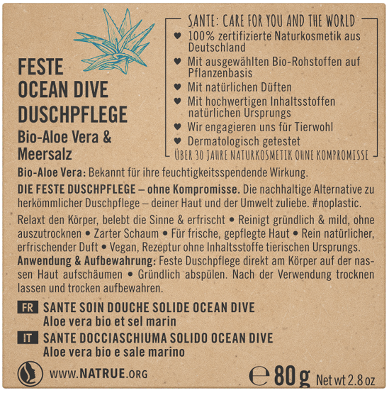 Sante Suihkugeelipala Ocean Dive; ruskea tuoteetiketti merkinnälle Feste Ocean Dive Duschpflege, saksankieliset kuvaukset, kuvakkeet ja ainesosakorostukset kuten luomu-aaloe vera ja merisuola; sisältää käyttötietoa ja esittelee kestävyyshyötyjä; suorakulmainen mattapintainen korttipakkaus valkoisella groteskitekstillä; muutamia pieniä kuvakkeita alareunassa; tausta yksivärinen, tuote lähikuvassa, ei ihmisiä tai käsiä näkyvissä.