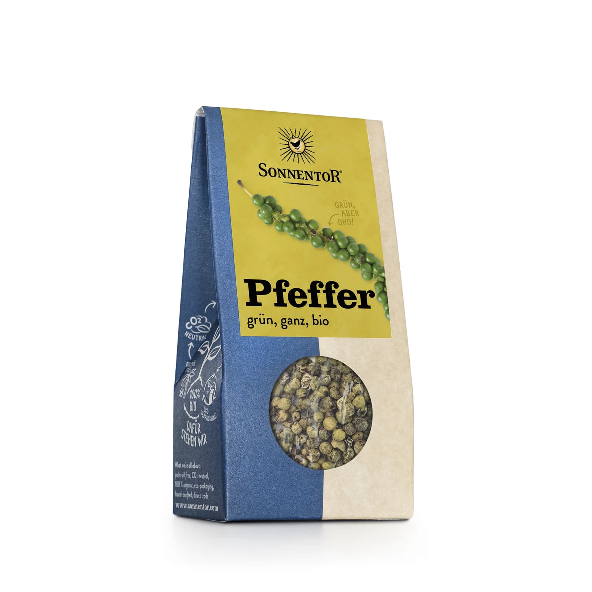 Sininen ja beige Sonnentor-pakkaus merkinnällä Pfeffer grün, ganz, bio esittelee pyöreän ikkunan, joka näyttää kokonaiset vihreät pippurit sisällä. Laatikko on suorakulmainen ja mattapintainen, ja siinä käytetään sekä antiikva- että pääteviivatonta typografiaa mustana painettuna. Kaikki pakkausteksti on saksaksi. Ihmisiä tai käsiä ei näy. Tuote on kuvattu tasaisessa valaistuksessa yksivärisellä valkoisella taustalla.