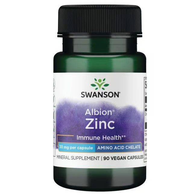 Swanson Chelated Zinc; Swanson Albion Zinc -ravintolisäpullo vihreällä muovikorkilla, sylinterin muotoinen läpikuultava meripihkanvärinen astia kiiltopinnalla; etiketti violetti valkoisin ja keltaisin groteskitekstein; luettavissa ”90 vegan capsules” ja ”30 mg per capsule” sekä brändinimi ja tuotetiedot; valkoinen tausta, ei ihmisiä tai käsiä.