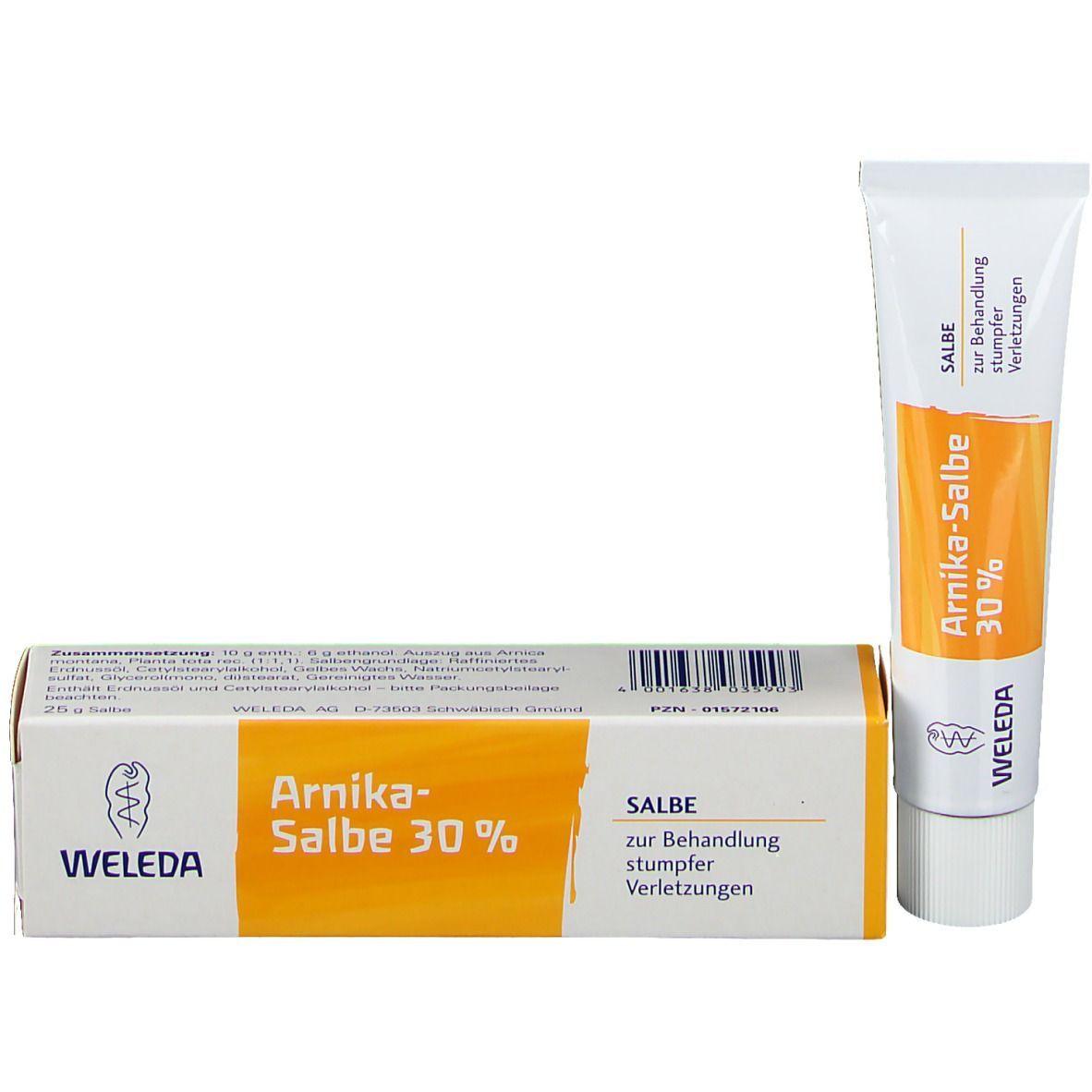 Weleda Arnica-Salbe 30% Voide; tuubi ja laatikko Weleda Arnika-Salbe 30% -voidetta, käytetään tylppien vammojen ja mustelmien hoitoon; molemmat esineet ovat suorakulmaisia, tuubi metallia tai laminoitua muovia kiiltäväpintaisena, laatikko pahvia ja mattapintaista; muotoilussa valkoinen pohjaväri oranssein ja sinisin raidoin; typografiassa lihavaa ja tavallista saksankielistä groteskitekstiä; ei ihmisiä tai käsiä näkyvissä; yksivärinen tausta, pelkkä tuotekuva.