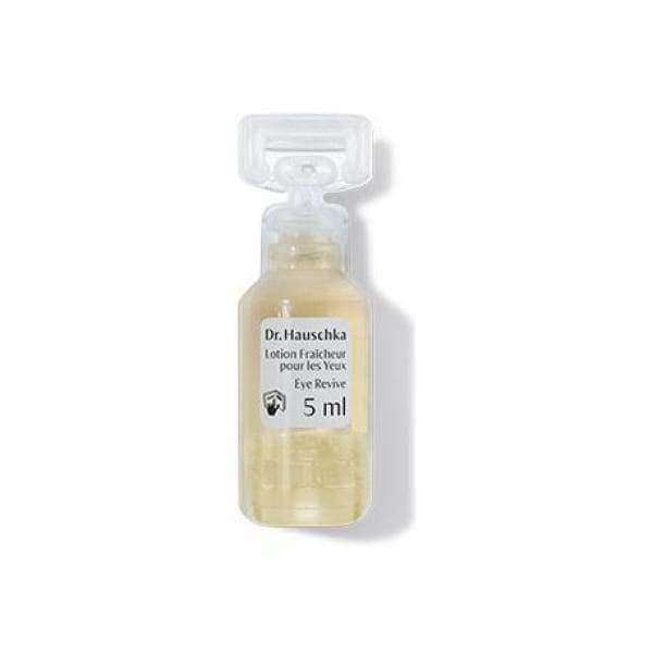 Dr. Hauschka Silmävirkiste -pullo, 5 ml, kirkas sylinterinmuotoinen lasi, valkoinen tasainen muovikorkki, vaaleankeltaista nestettä; musta-oranssi groteskiteksti valkoisella paperietiketillä