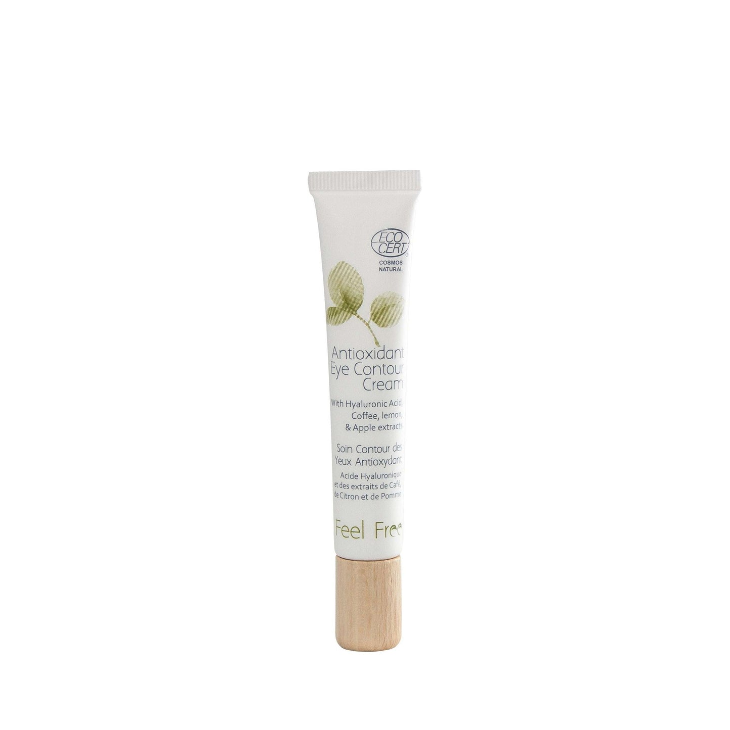 A white tube of Feel Free Antioxidant Eye Contour Cream with a wooden cap, green leaf design, and product text on the front, featuring antioxidant benefits, standing upright against a white background. The tube is cylindrical and has a matte finish. Label text uses simple sans-serif font. Product is alone in the center of the image with no visible people or hands.