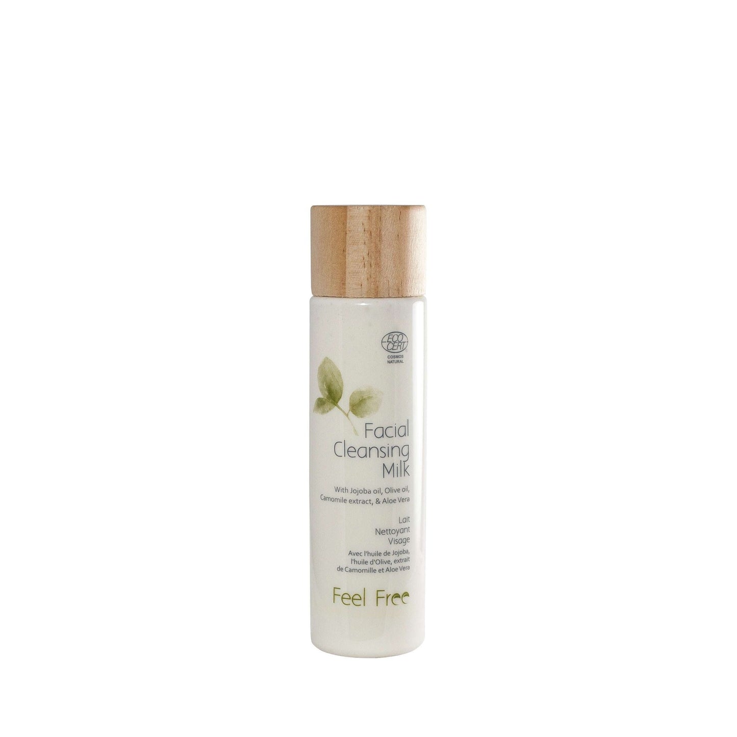 A bottle of Feel Free Facial Cleansing Milk with a wooden cap, cylindrical white body, and matte finish. Green leaf graphics printed on the front. Visible label includes both English and French text in a clean sans-serif font style. The item is set against a plain white background with no additional objects or people present. Camera is at eye level, product fills most of frame.