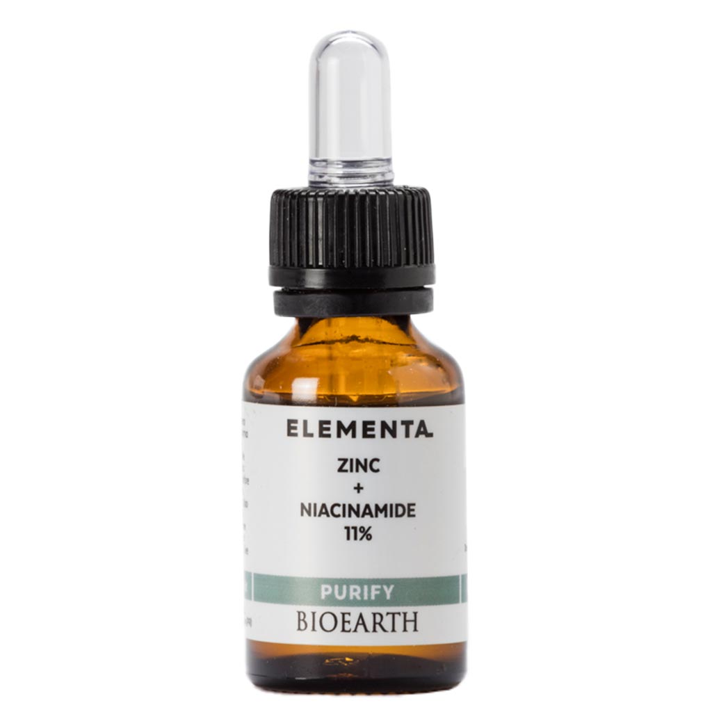Bioearth Elementa Niacinamide 10% + Zinc 1% Booster; ruskea, lieriön muotoinen ja mattapintainen lasinen tiputinpullo mustalla korkilla, suorat kyljet ja pyöristetyt hartiat, valkoisella taustalla; sinkkipitoinen kaava; yksinkertainen musta groteskiteksti valkoisella etiketillä.