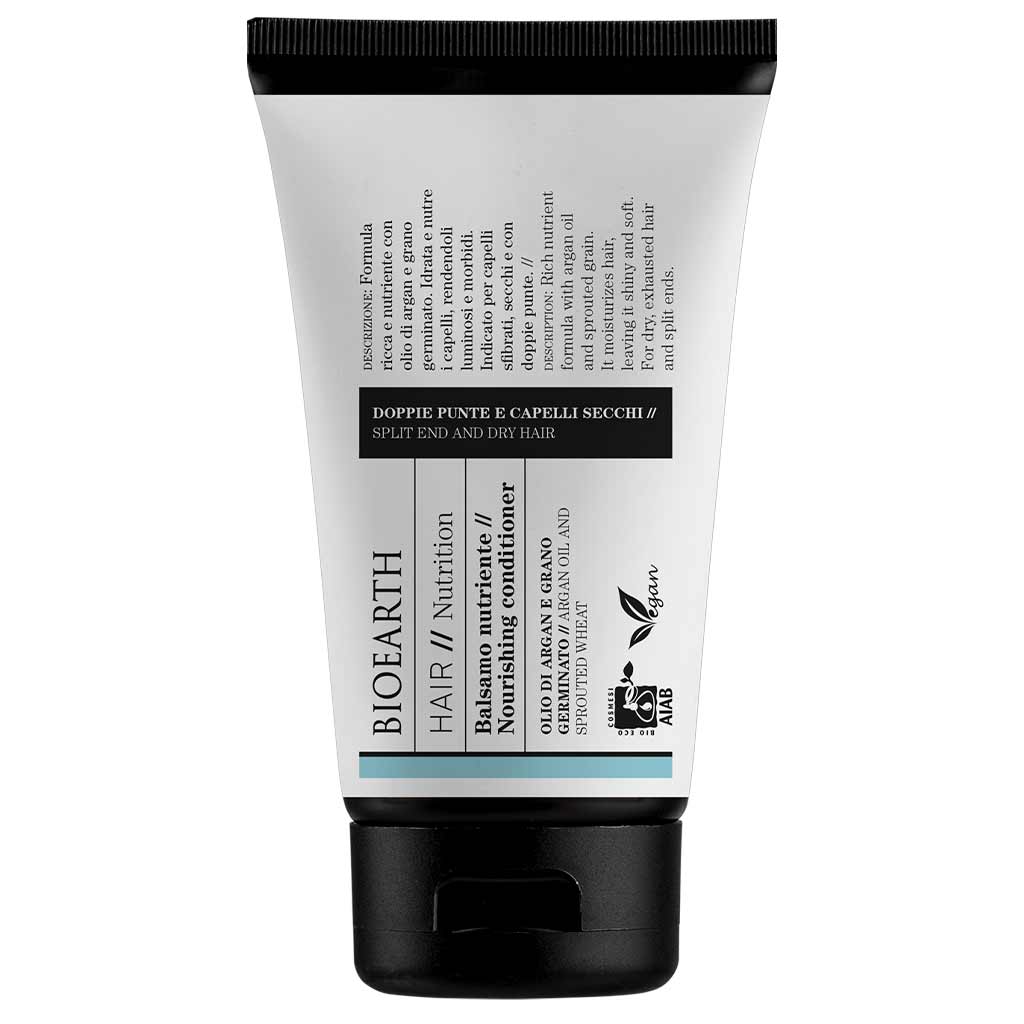 Bioearth HAIR 2.0 hoitoaine kuiville hiuksille; valkoinen, lieriön muotoinen ja mattapintainen tuubi mustalla korkilla, tarkoitettu haaraantuneille latvoille ja kuiville hiuksille; mustaa ja petroolinsinistä groteskitekstiä, suurempi teksti "HAIR NUTRITION"; valkoinen tausta.
