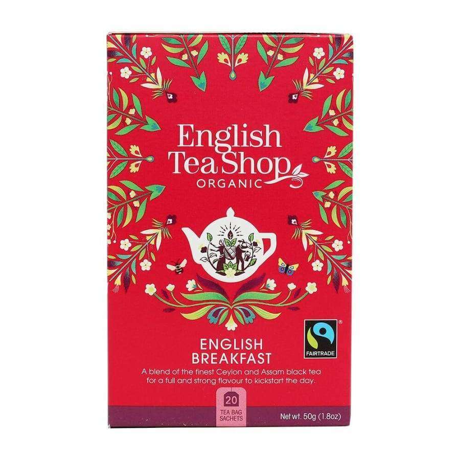 English Tea Shop Luomu English Breakfast -tee, punainen pakkaus, kukkakuvioita ja teekannukuvitus, luomu- ja Fairtrade-merkit; mattapintainen suorakulmainen rasia, valkoinen-vihreä antiikvateksti, 20 pussia