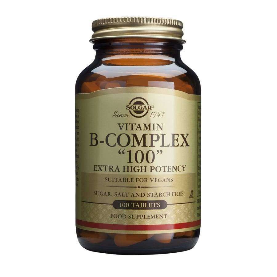 Solgar Vitamiini B-Complex 100 Extra High Potency -pullo, 100 tablettia, sopii vegaaneille, ei sokeria, suolaa tai tärkkelystä; ruskea lasipullo metallinkultaisella kierrekorkilla, mattapintainen beige etiketti mustalla tekstillä