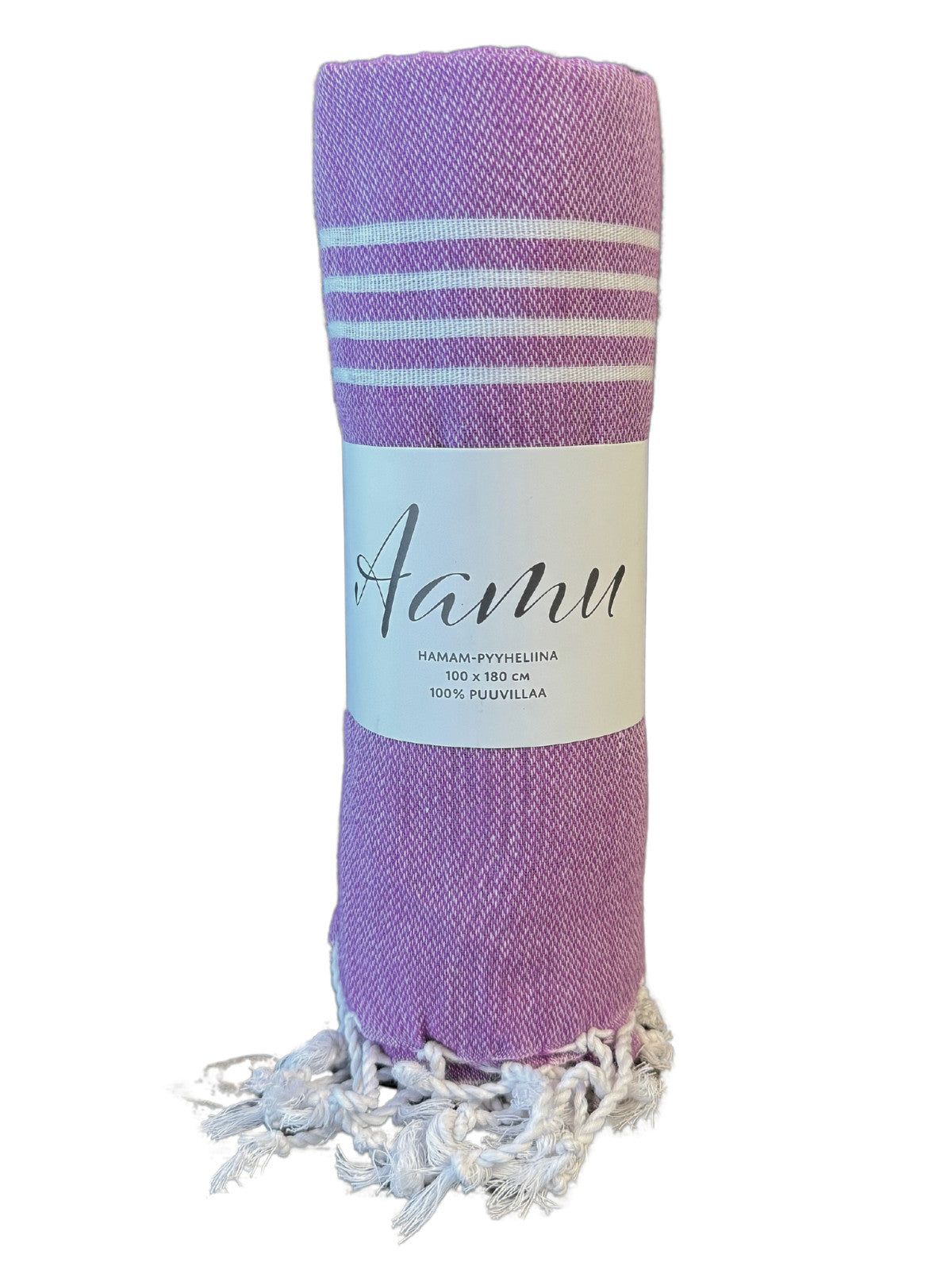 A rolled lavender peshtemal towel with white decorative stripes, fringed ends, and an Aamu label. The towel is made of a flat-weave fabric with a matte finish. The Aamu label is sewn onto one end and displays the brand name in sans-serif font. The product is photographed on a plain, light background and no packaging or people are visible.