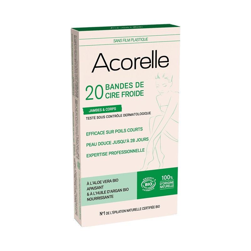 Acorelle Karvanpoistoliuskat Vartalolle: 20 liuskan pakkaus jaloille ja vartalolle, suorakulmainen mattavalkoinen ja vihreä pakkaus ranskankielisin tekstein sekä kuvin aloe vera -lehdistä ja arganpähkinöistä; pääteksti groteskikirjasimella, pienempi lisätieto pienemmällä kirjasimella; neutraali tausta pehmeässä valaistuksessa, kuva otettu ylhäältä.