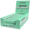 A box of Barebells Minty Chocolate soft protein bars, with several mint-green bars displayed inside. Rectangular cardboard box with a glossy finish; front panel open to expose individually wrapped, rectangular bars. Main colors are mint green and brown. Sans-serif font in white and brown print reads “Barebells Minty Chocolate.” Additional label text includes “16 grams of protein” and “no added sugar.” The box is photographed on a plain white background in a studio shot. No people or hands are present in