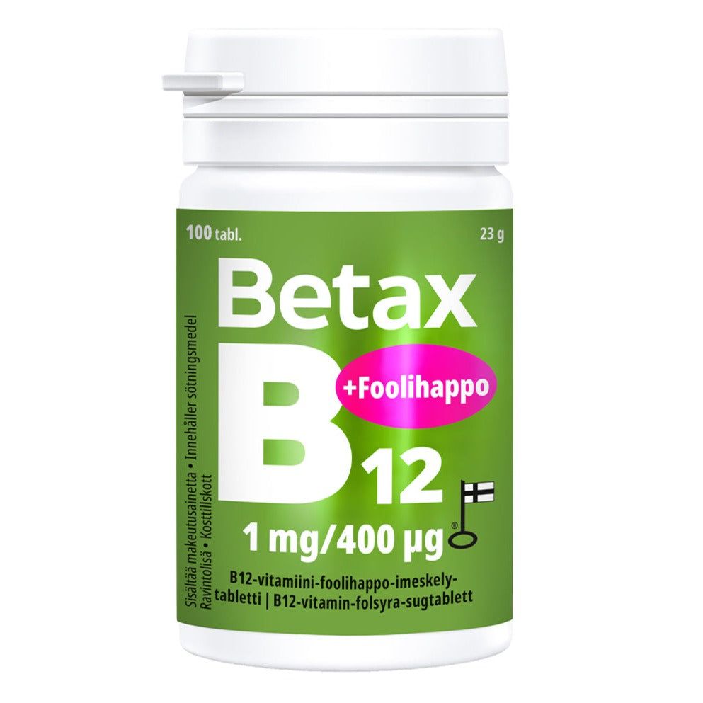 A white plastic bottle with a matte finish, cylindrical shape, and screw cap is shown. The label displays “Betax B12 + Foolihappo,” dosage information “1 mg/400 µg,” and symbols for 100 tablets and Finnish origin in clear sans-serif font. The product is set against a solid green background. No people or hands are visible in the shot.