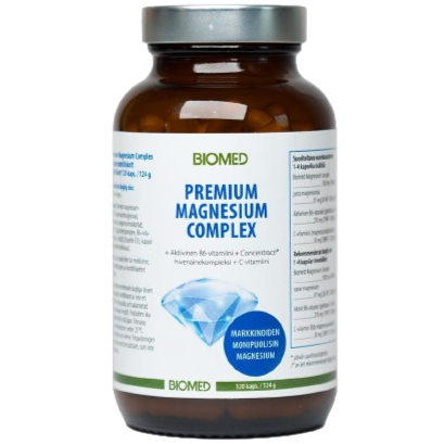 Biomed Premium Magnesium Complex, ruskea pullo tekstillä "BIOMED PREMIUM MAGNESIUM COMPLEX", ravintosisältötiedot ja tuotetiedot näytettynä valkoista taustaa vasten; pullo sylinterimäinen mattapinnalla ja tumma, todennäköisesti muovinen korkki; etiketissä groteskifontit valkoisena ja sinisenä tummalla pohjalla; keskellä etikettiä näkyvä sininen kristallikuvitus; ei ihmisiä eikä käsiä näkyvissä.