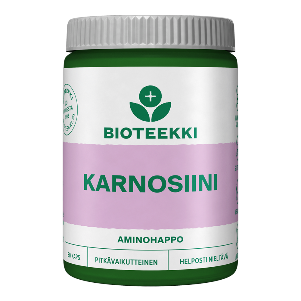 Bioteekki Karnosiini; vihreä-valkoinen purkki tekstillä "BIOTEEKKI KARNOSIINI" violetilla nauhalla, sisältää 60 kapselia; muovipurkki mattapinnalla, lieriön muotoinen kierrekorkillinen; etiketti lihavoitua sans-serif-tekstiä lohkokirjaimin eri fonttipainoin; pääteksti sisältää "AMINOHAPPO", "PITKÄVAIKUTTEINEN" ja "HELPPOSTI NIELTÄVÄ" aminohappokaavasta; kuvattu valkoista taustaa vasten, ei ihmisiä tai toimintaa näkyvissä.
