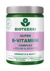 Bioteekki Super B-vitamiini -purkki, vihreä muovikierrekorkki, sylinterinmuotoinen läpinäkyvä runko, kapselit näkyvissä; vaaleanpunainen etiketti, lihavoitu valkoinen-musta groteskiteksti B-vitamiineista, koliinista ja inositolista