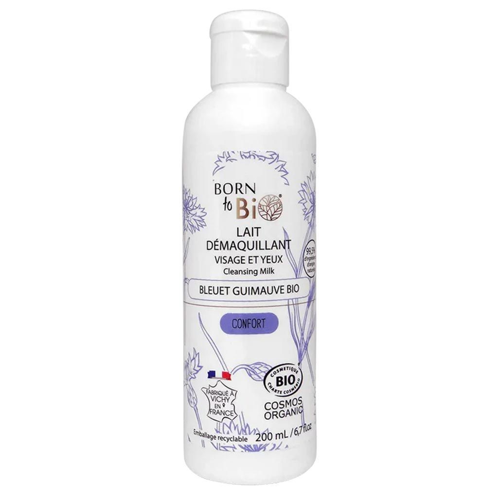 Born to Bio Blueberry Floral Water Cleansing Milk; valkoinen pullo puhdistusmaitoa sinisin kukkakuvioin, merkitty kasvoille ja silmille sopivaksi; 200 ml:n tuote on luomu, kierrätettävä ja ranskalaisin ympäristösertifioinnein; sylinterinmuotoinen muovipullo mattapinnalla; etiketissä modernia groteskitypografiaa; kuvattu valkoisella taustalla ilman ihmisiä tai muita esineitä.
