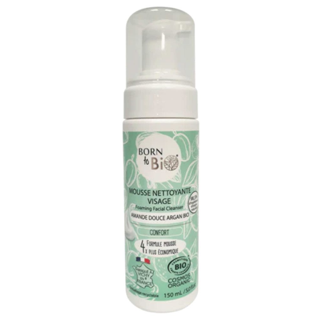 Born to Bio Cleansing Foam For Normal Skin; pullo vaahtoavaa kasvopesuainetta luomumantelin ja arganöljyn kanssa, valkoinen muovipumppu ja sylinterinmuotoinen runko; etiketti on vihreä ja mattapintainen, valkoista lihavoitua tekstiä ja yksityiskohtaisia kasvipiirroksia; tuotenimi ja tärkeimmät ainesosat ovat luettavissa; tuote kuvattu yksivärisellä taustalla.