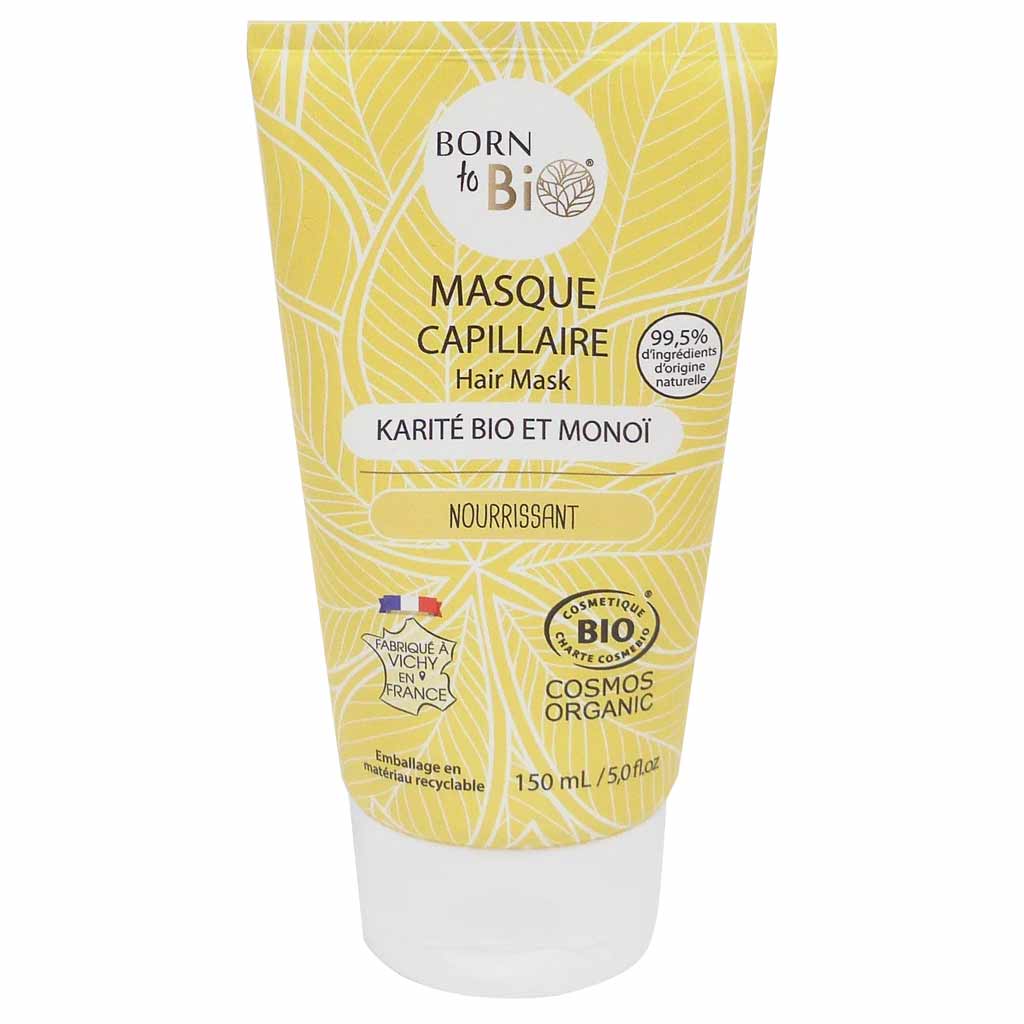 Born to Bio Hair Mask -putkilo sheavoilla ja monoiöljyllä, merkitty luomuksi ja ravitsevaksi, esiteltynä valkoisella taustalla; putkilo mattakeltainen vihrein lehtikuvioin; muoto lieriömäinen pyöristetyllä läppäkorkilla; sekä ranskan- että englanninkielinen teksti lihavoidulla groteskikirjasimella etiketissä; ei ihmisiä tai käsiä näkyvissä kuvassa.
