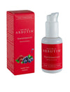 A red box and a matching bottle labeled Detria Arbutin Vitamiiniseerumi Vitamin Oil Serum are pictured; both have a matte finish. The box includes printed berries and a Finnish flag graphic, with readable product benefit text in sans-serif font. The background is plain, with no visible people or hands. The image is a straight-on product shot.