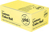 A yellow rectangular cardboard box with a matte finish, labeled Organic Lemon Cake Ball by Dig in clear sans-serif text. The front of the package includes vegan, gluten-free, and refined sugar-free claims in separate sections. Icons and symbols for plant-based ingredients and certifications are displayed on one side. The box is photographed front-facing against a neutral background with no people present. A yellow box labeled Organic Lemon Cake Ball by Dig. The packaging highlights that it is vegan,