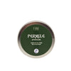 A round tin container labeled PERKELE Aftershave with a green lid. The text also reads Tasapainottava Voide Balancing Balm and FIINI at the top. A small blue key icon appears near the bottom, hinting at its unique blend of ingredients. The tin has a matte finish and clear, bold sans-serif typography in uppercase letters. Background is plain white, no people or props are present. Close-up product shot from above angle.