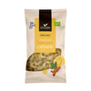 A beige bag of Foodin organic dry roasted curry-lemon cashews, featuring images of cashews, lemon, and spices on the front, along with an organic certification symbol in the top right corner. Matte finish packaging with a rectangular shape. Font is bold and modern. The bag stands upright against a plain background in a product-only studio shot. No people or hands visible.