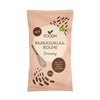A pink 100g package labeled FOODIN Dreamy Raakasuklaarouhe with 44% cocoa. The matte pouch is rectangular with a sealed top, front-facing in the image. Design includes a simple line-drawn whisk and small illustrated chocolate pieces near the bottom. Label text uses bold uppercase sans-serif font; additional text appears in smaller lettering below. Plain light background, no people visible.