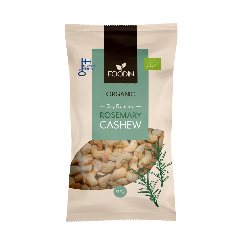 A beige bag of Foodin organic dry roasted rosemary cashews, 120g. The package has a matte finish and upright rectangular shape. Images of whole cashews and a sprig of rosemary are pictured on the front. Minimalist sans serif typography displays product name and weight. Certification and organic logos appear at the bottom. Plain background, no people present.