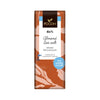 A Foodin 60% Almond Sea Salt Organic Raw Chocolate bar with a marbled brown and beige wrapper, labeled No added sugar and Handmade in Vaajakoski, Finland. The packaging is rectangular, matte finish, with sans-serif white text. Label states “No added sugar” and “Handmade in Vaajakoski, Finland”. No people or hands are visible. Neutral background. Close-up shot.