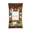 A brown, matte-finish 50g Foodin bag stands upright with a rectangular shape. The label reads “Raw Chocolate Macadamia” in bold white sans-serif font. A photo of chocolate-covered macadamia nuts is displayed below the product name. Clear icons state No Added Sugar, Vegan, and Organic. Finnish and EU organic certification logos are present. Neutral background; no people or props.