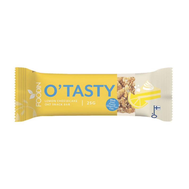 Foodin O'Tasty Oat Bar Lemon Cheesecake, 25 g; keltavalkoinen kääre; kannessa kuvia kaurahiutaleista, sitruunaviipaleesta ja kermaisesta juustokakusta; suorakulmainen kääre mattapinnalla ja rypytetyt reunat; etuosan teksti lihavoitua ja isokirjaimista mustalla; ei ihmisiä tai käsiä näkyvissä, tausta valkoinen ilman muita rekvisiittoja.