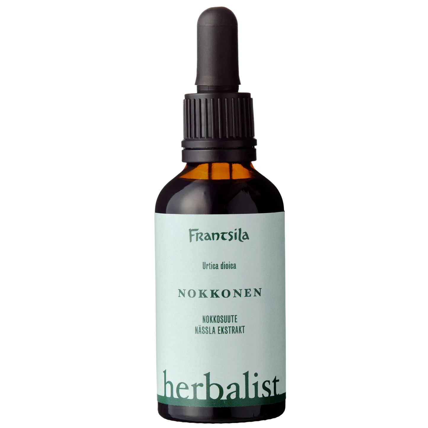 Frantsila Nokkosen Herbalist -tippapullo, ruskea lasi, kiiltäväpinta, musta tippakorkki, valkoinen-vihreä-musta etiketti suomenkielisellä tekstillä