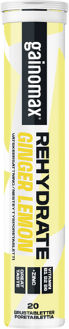 Gainomax Rehydrate Nesteytysporetabletti Ginger Lemon -putkilo, jossa lihavoitua mustaa, valkoista ja keltaista tekstiä; lieriömäinen muovinen putkilo mattapinnalla ja yhteensopivalla korkilla; tuotenimi on selkeästi luettavissa; tausta yksinkertainen ja siisti, ei ihmisiä tai muita esineitä näkyvissä.