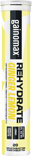 Gainomax Rehydrate Nesteytysporetabletti Ginger Lemon -putkilo, jossa lihavoitua mustaa, valkoista ja keltaista tekstiä; lieriömäinen muovinen putkilo mattapinnalla ja yhteensopivalla korkilla; tuotenimi on selkeästi luettavissa; tausta yksinkertainen ja siisti, ei ihmisiä tai muita esineitä näkyvissä.