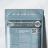 Heey! Creatine Monohydrate, maku Natural; sinivihreän ravintolisäpussin takaosa tekstein kreatiinin hyödyistä, käyttöohjeista, ainesosista, ravintosisältötiedoista ja QR-koodista; yläosassa lukee No Flavouring. No Additives. Just pure creatine; pussi mattapintainen ja suorakaiteen muotoinen saumatuin reunoin; valkoista groteskitekstiä suurimmassa osassa merkintöjä; kuvassa vain tuote valkoisella taustalla, ei ihmisiä tai rekvisiittaa.