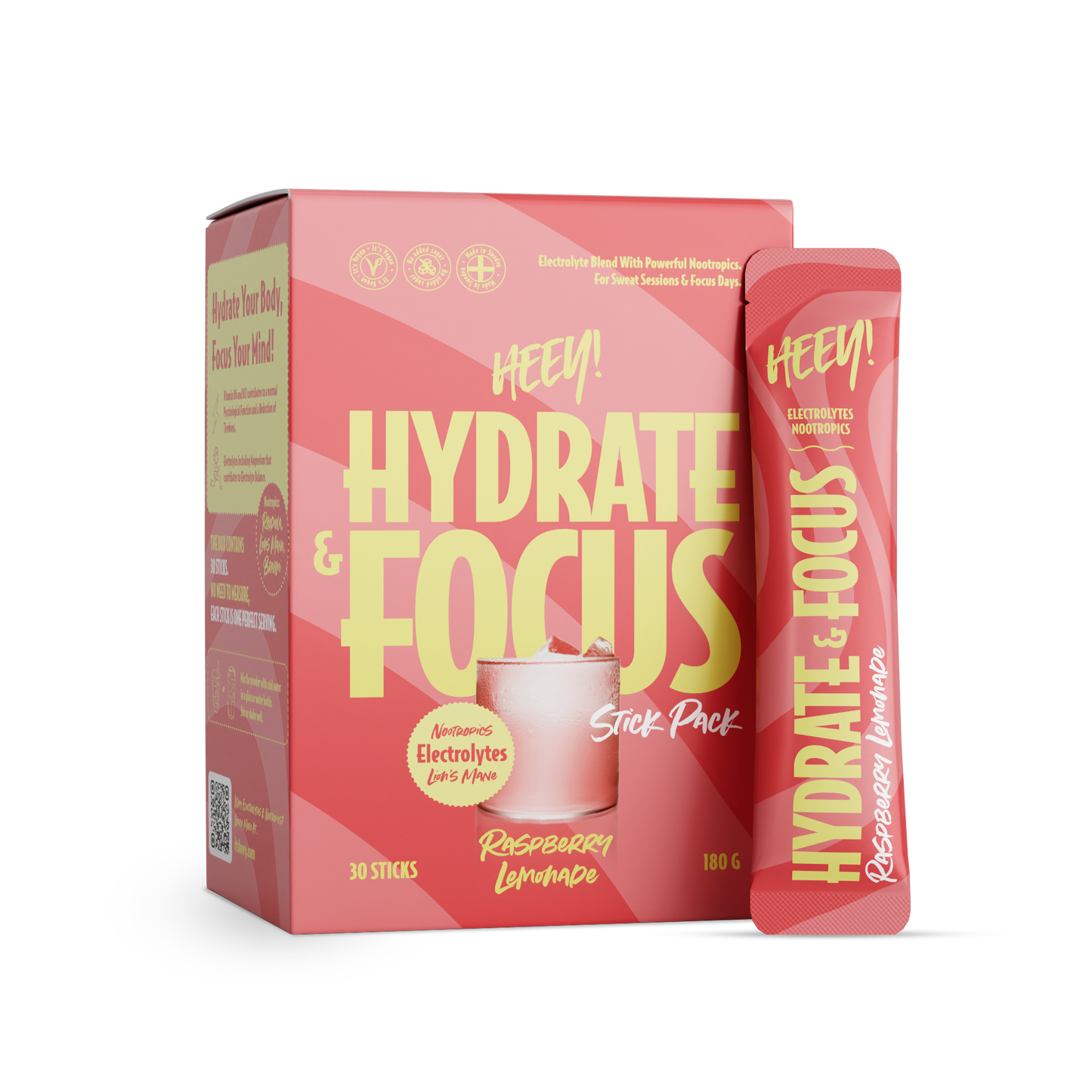 Heey! Hydrate & Focus Electrolytes Raspberry Lemonade; laatikko ja annospussi Hey! Hydrate & Focus -vadelmalimonadin elektrolyyttijuomajauhetta, lihavaa keltaista tekstiä vaaleanpunapunaisella taustalla, etupuolella virkistävä lasi elektrolyyttipitoista vaaleanpunaista juomaa jään kera; pakkaus on mattapintainen ja suorakulmainen; luettavassa etikettitekstissä tuotenimi ja maku; ei ihmisiä tai käsiä näkyvissä; kuva otettu suoraan edestä yksivärisellä taustalla.