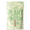 Heey! Plant Protein, maku Vanilla-Pear; vaaleanvihreä pussi tekstillä HEEY! PLANT PROTEIN, kuva vanilja-päärynäshakesta pillin kera; mattapintainen joustava materiaali, suorakaiteen muotoinen pohja, lämpösaumatut reunat; lihavoitu groteskityypografia valkoisena ja mustana; etuteksti mainitsee 85 % kasviproteiinia, B12-vitamiinia ja 500 g; ei ihmisiä tai käsiä; vaalea tausta, tuote pystyssä suoraviivaisessa studiokuvassa.