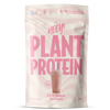 A pink and white pouch labeled HEEY! PLANT PROTEIN with an image of a pink smoothie and text White Chocolate Raspberry. The 500g package features nutrition icons at the top, highlighting its plant protein content. The pouch is rectangular with a matte finish, zip-seal visible at the top edge. Typography is bold sans-serif in white and dark pink. No people or other objects are present; background is plain white, shot shows only the front of the pouch centered in frame.