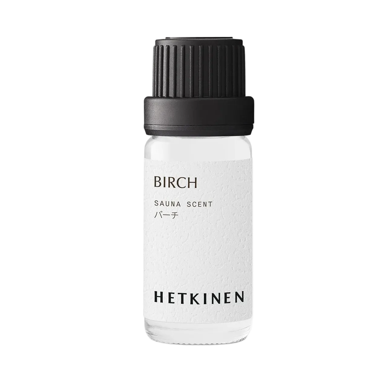 Pieni kirkas pullo merkinnällä BIRCH SAUNA SCENT, jossa on japaninkielistä tekstiä ja brändinimi HETKINEN. Lieriömäinen lasirunko, matta musta uritettu kierrekorkki, ja litteä valkoinen etiketti yksinkertaisin mustin pääteviivattomin fontein. Etiketissä ei ole kuvitusta. Neutraali tausta, tuote keskitetty kuvassa, ei ihmisiä tai käsiä näkyvissä.