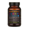Kiki Health Body Biotics Gummies Maitohappobakteeri; mattamusta sylinterinmuotoinen pullo sileällä kierrekorkilla; etiketti on tumma valkoisin ja vihrein groteskitekstein, jossa lukee selkeästi ”Body Biotics Gummies for Children 4+, featuring SBO Bacterial Cultures and suitable for vegans, containing 30 fruit gummies by Kiki Health”; astia seisoo pystyssä valkoista taustaa vasten; ei ihmisiä tai toimintaa näkyvissä.