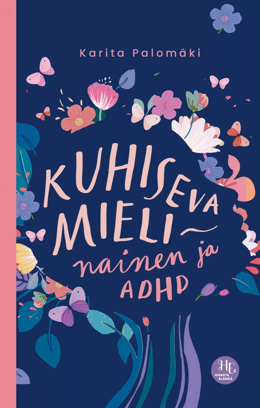 Kuhiseva mieli – nainen ja ADHD, Karita Palomäen kirjan kansi tummansinisellä pohjalla; kannessa värikkäitä kukka- ja perhoskuvituksia; kansi suorakaiteen muotoinen, pinta tasainen ja mattapintainen; nimeke ja tekijän nimi valkoisella ja vaaleanpunaisella fontilla; kuvassa ei näy ihmisiä eikä käsiä.